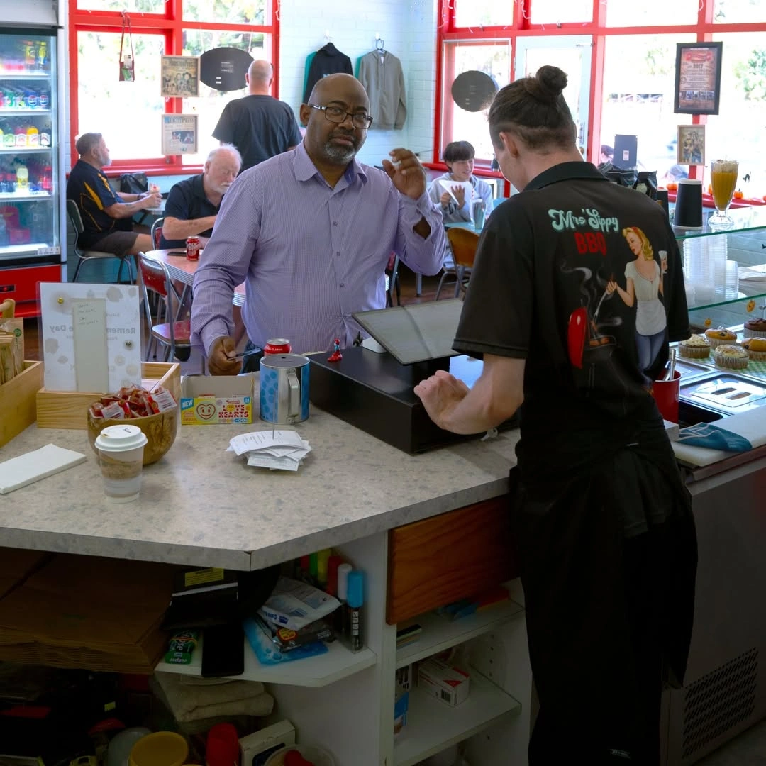 Mrs'Sippy BBQ serving customers at a market event